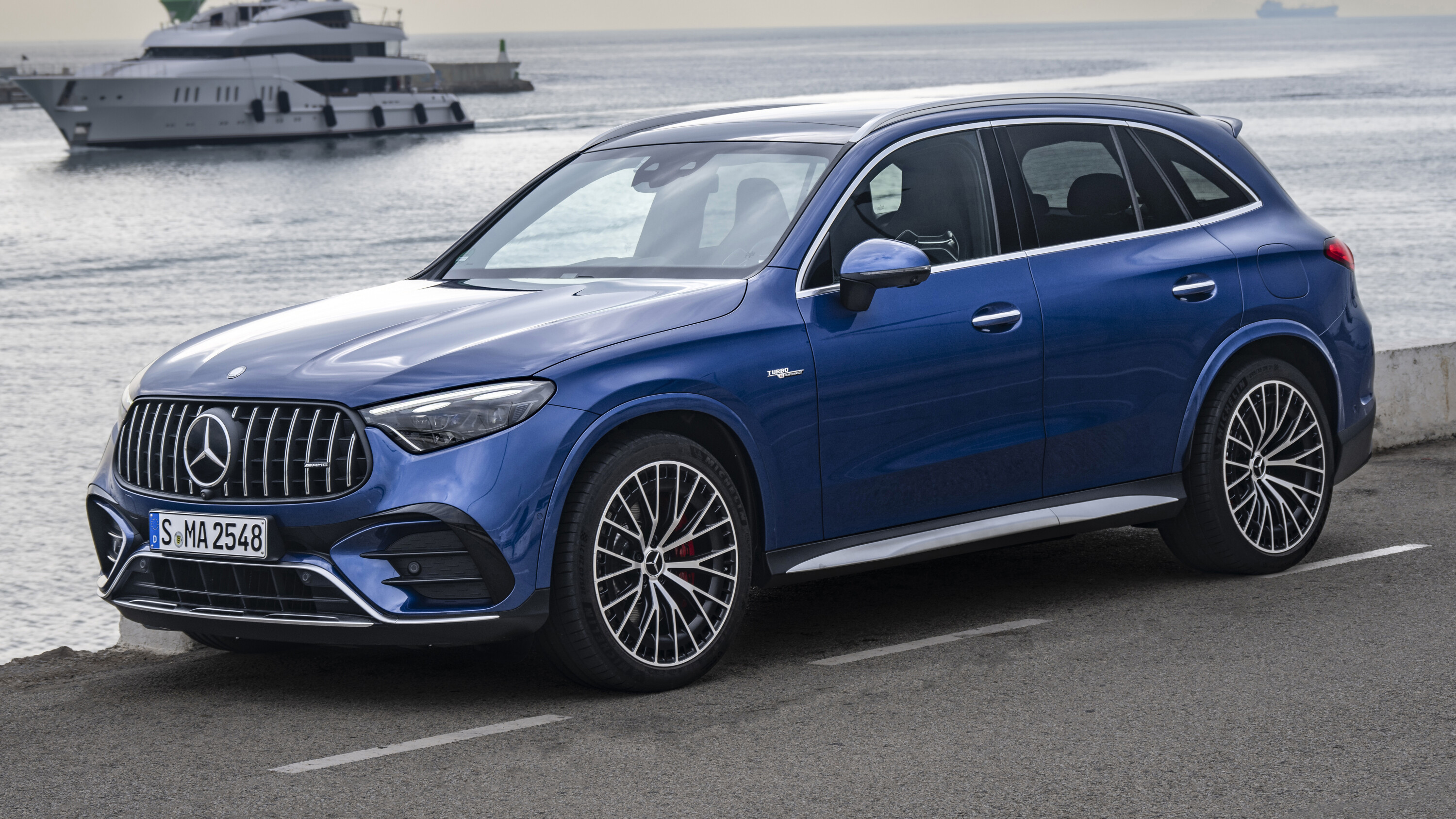 8d4913cc/2024 mercedes amg glc 63 blue suv 5 jpg