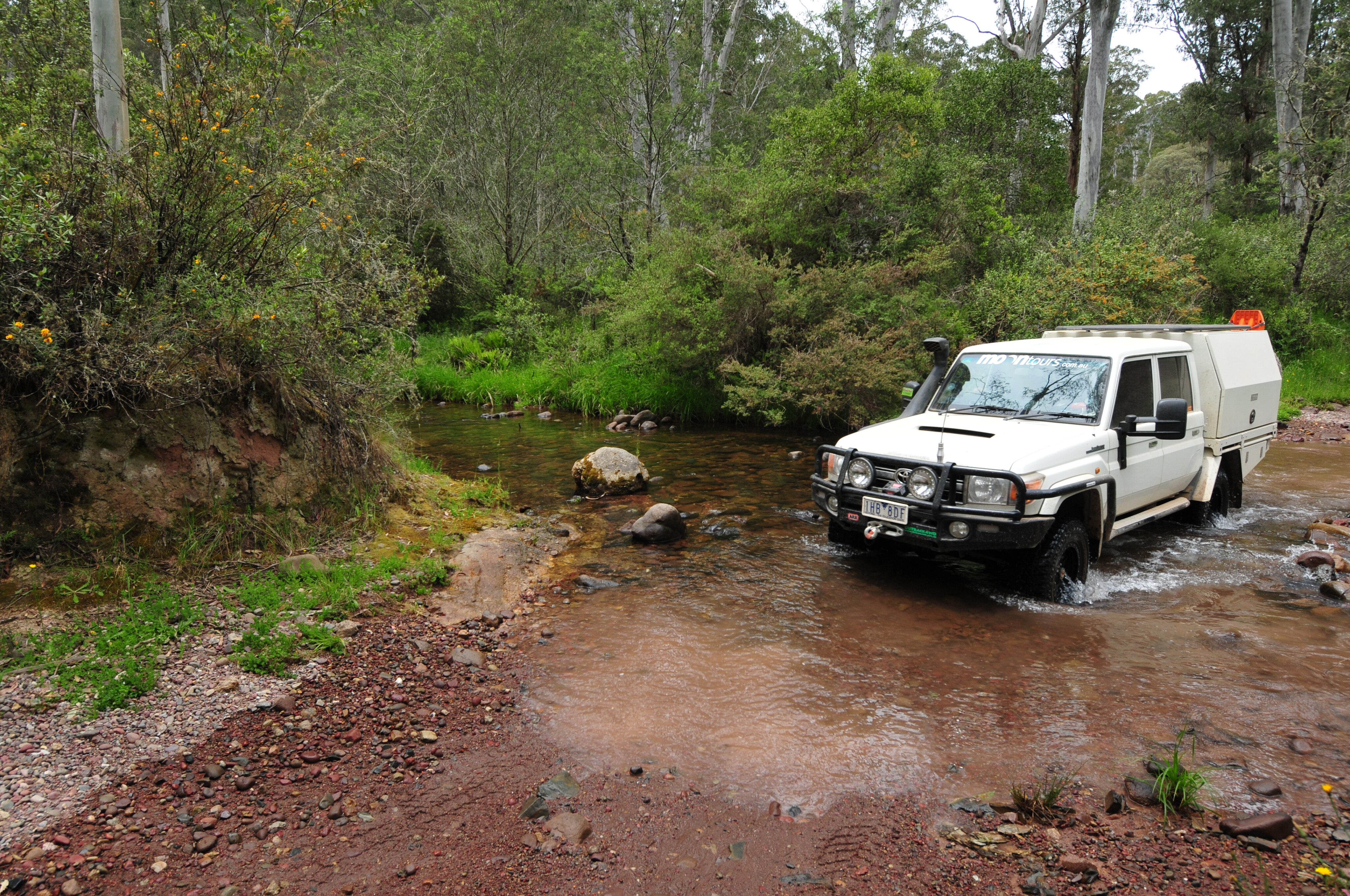 2b8f2c86/victoria high country 5p032 crossing the shallow waters of the upper reaches of the howqua river jpg