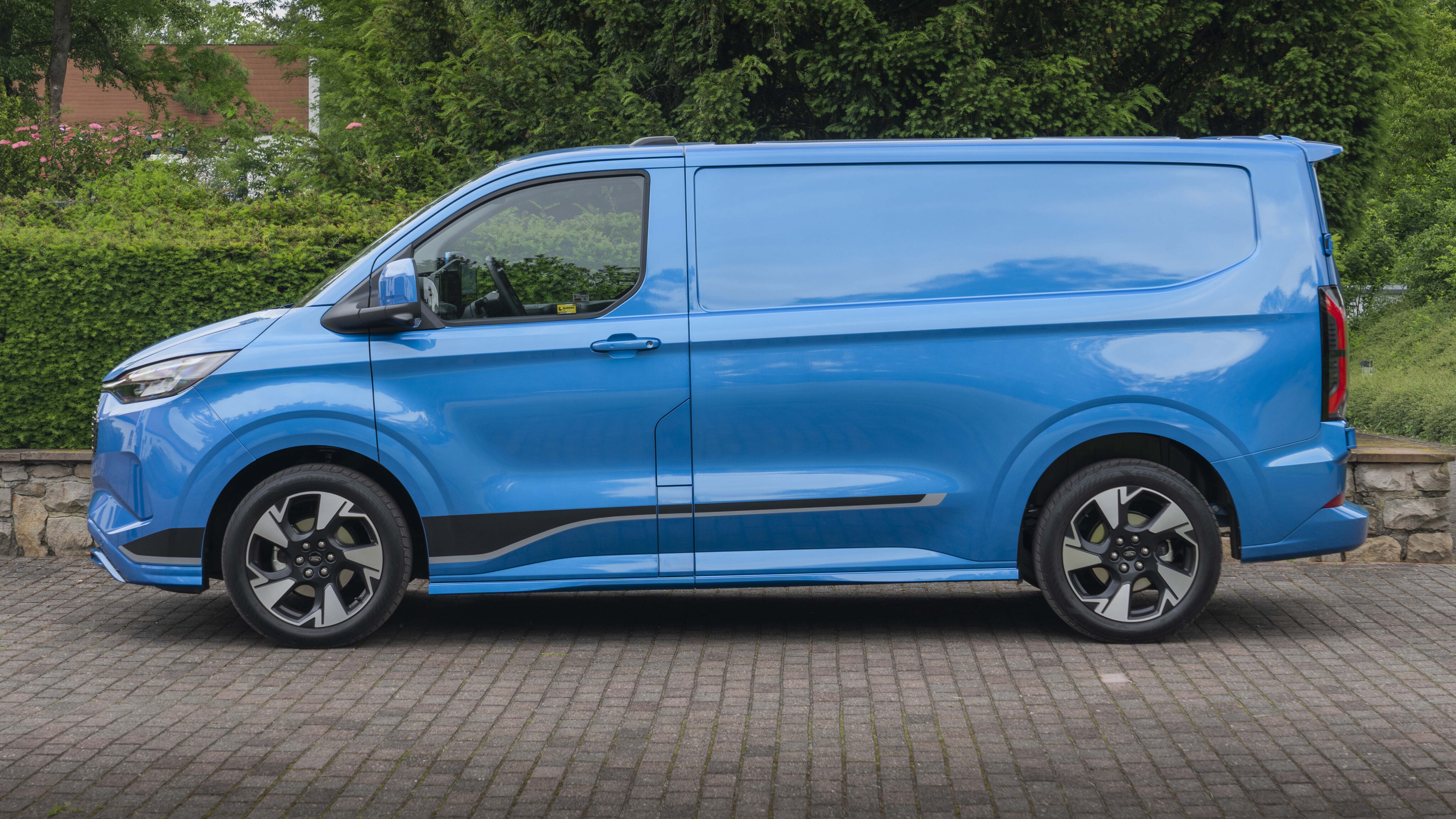 78f313d4/2024 ford e transit custom blue 2 jpg