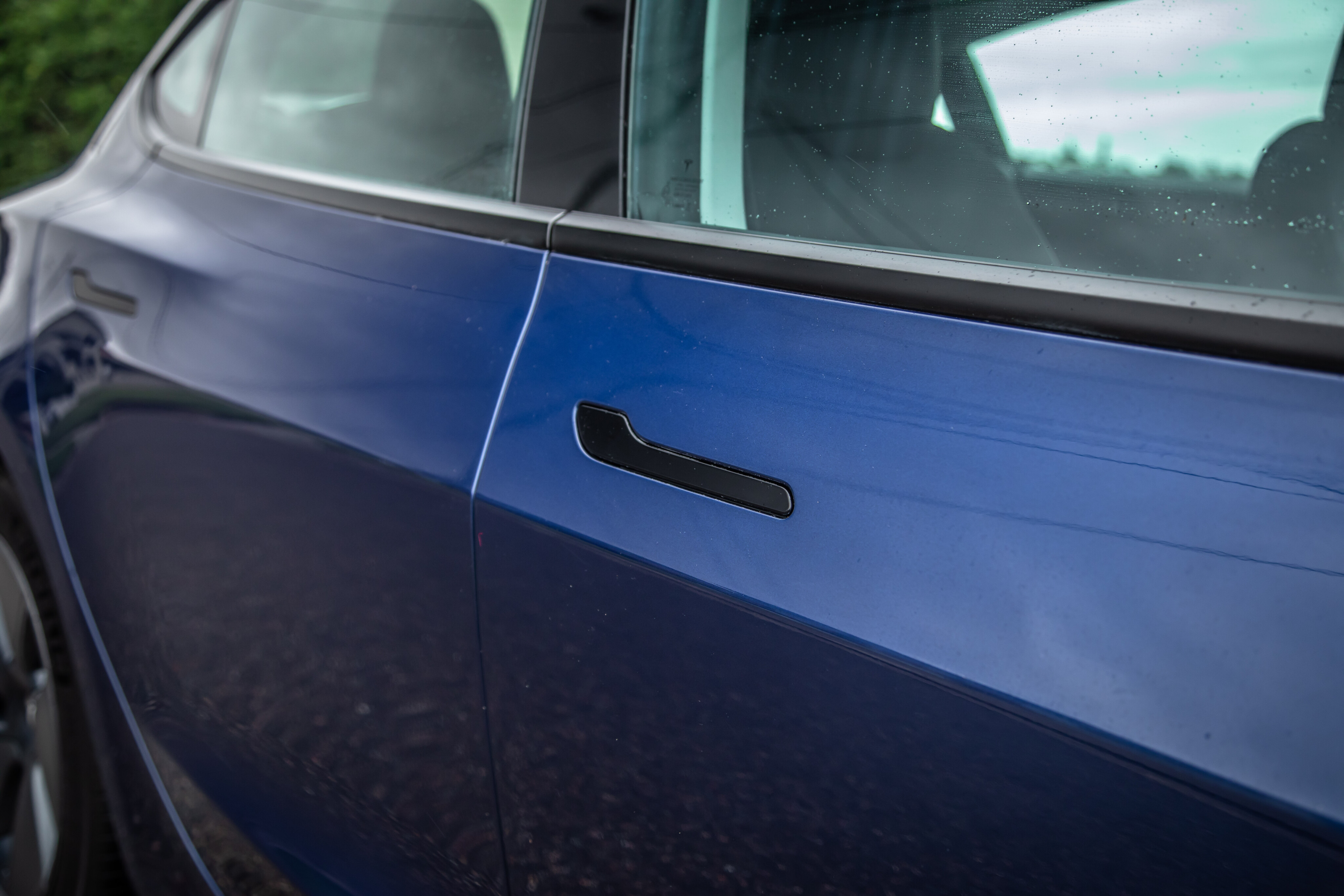 ad100912/2022 tesla model 3 deep blue metallic australia detail exterior door handle srawlings jpg