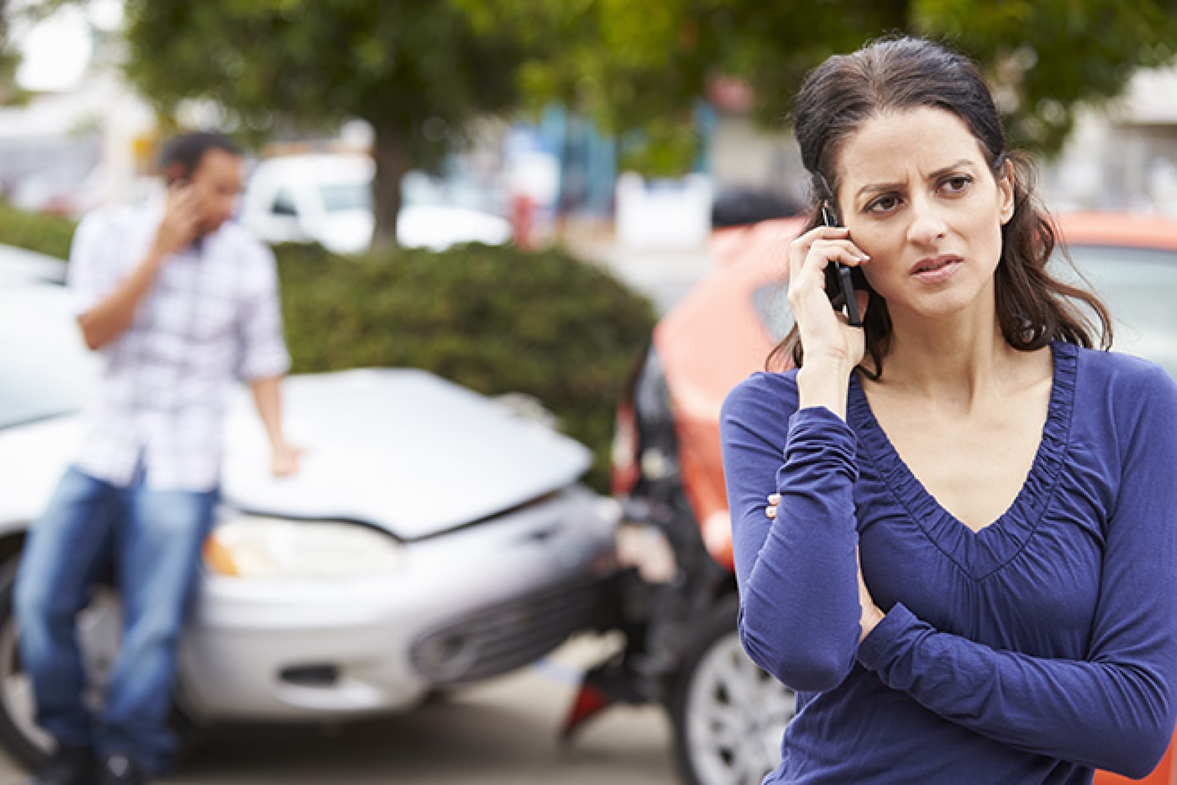 c5180a55/worried woman calling police after accident jpg