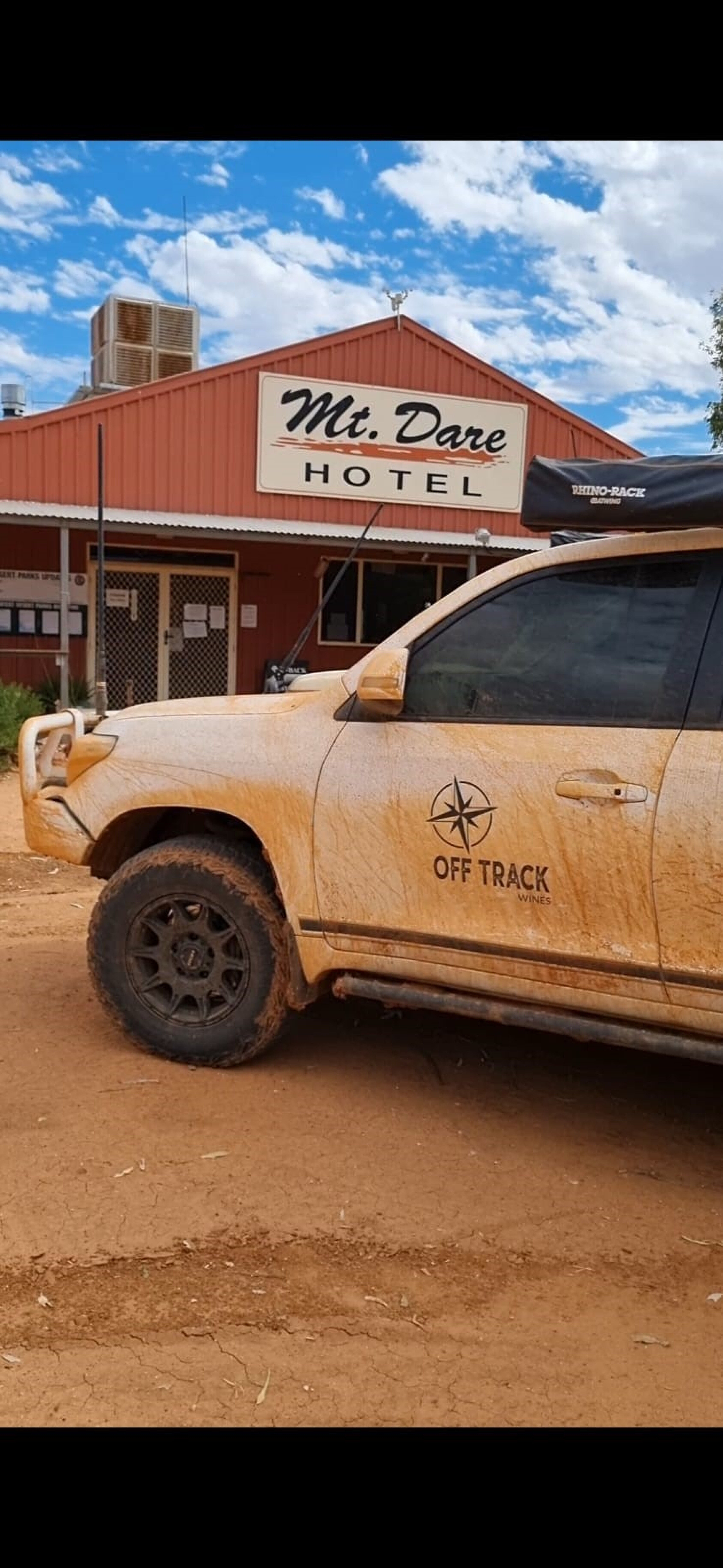 f7952c27/brett phone photo mt dare with thor mount dare south australia outback pub crawl 4x4 australia jpg