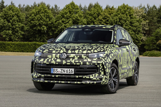 6da10e82/2024 Volkswagen Tiguan   camo front jpg